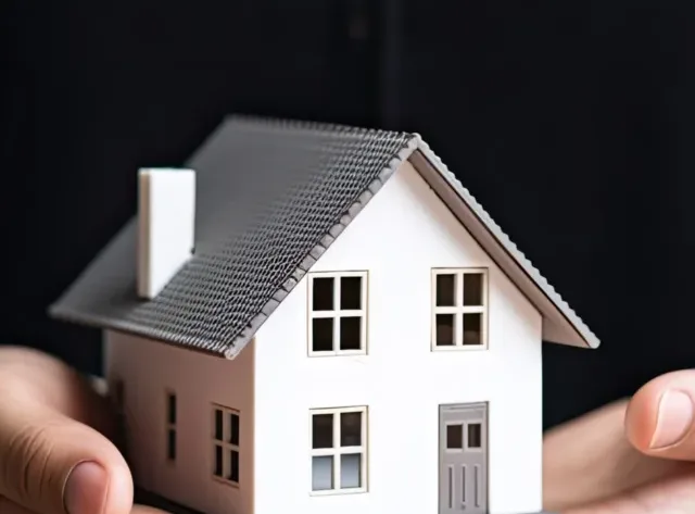 woman showing with one hand a mini house. Real state concept. Ai generative